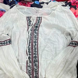 White red and blue see-through white shirt